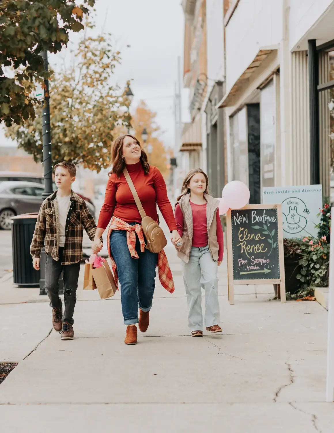 Mom and kids browsing shops in downtown Marion