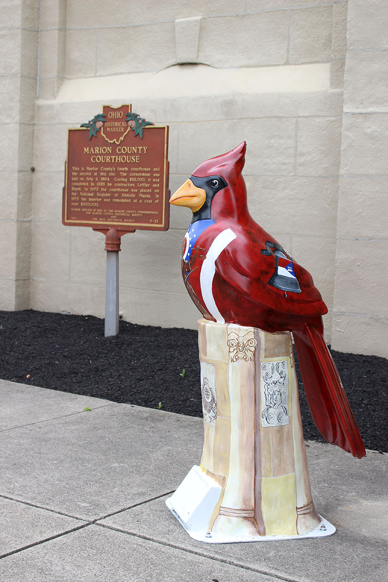A cardinal sculpture on display in downtown Marion.