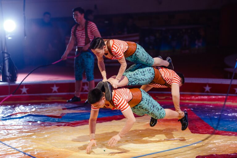 circus acrobats in a pyramid formation