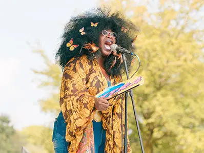 Woman singing on stage at the annual Blues Festival in Marion.